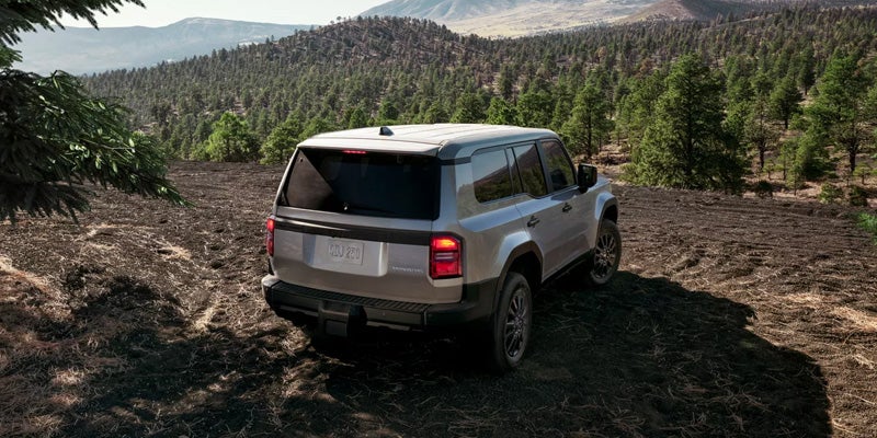 2027 Toyota Land Cruiser cabin showing five-passenger seating and available heated and ventilated second-row seats