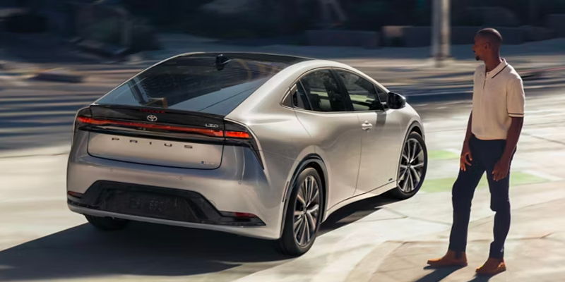 2027 Toyota Prius driving smoothly with 2.0-liter fifth-generation hybrid powertrain
