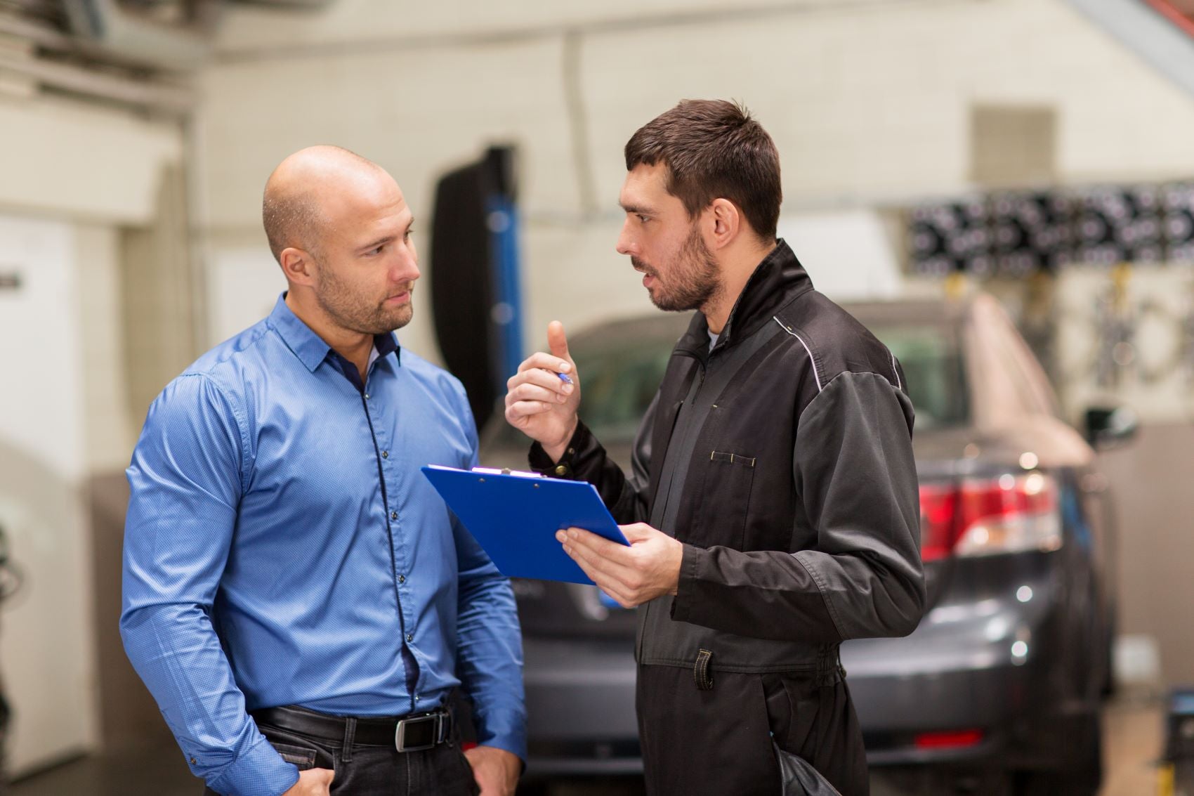 Certified Technician Talking to Customer